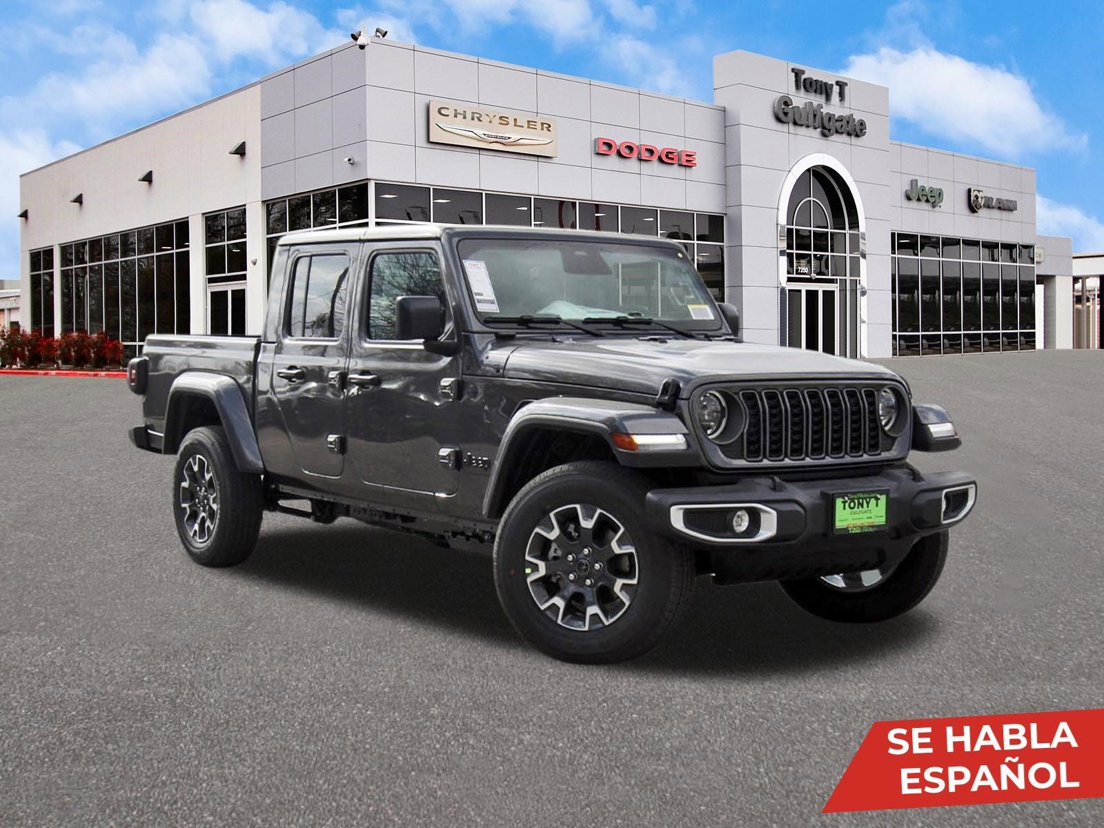 2026 Jeep Gladiator Sahara 4x4 in Granite Crystal Metallic Clearcoat — front three-quarter view