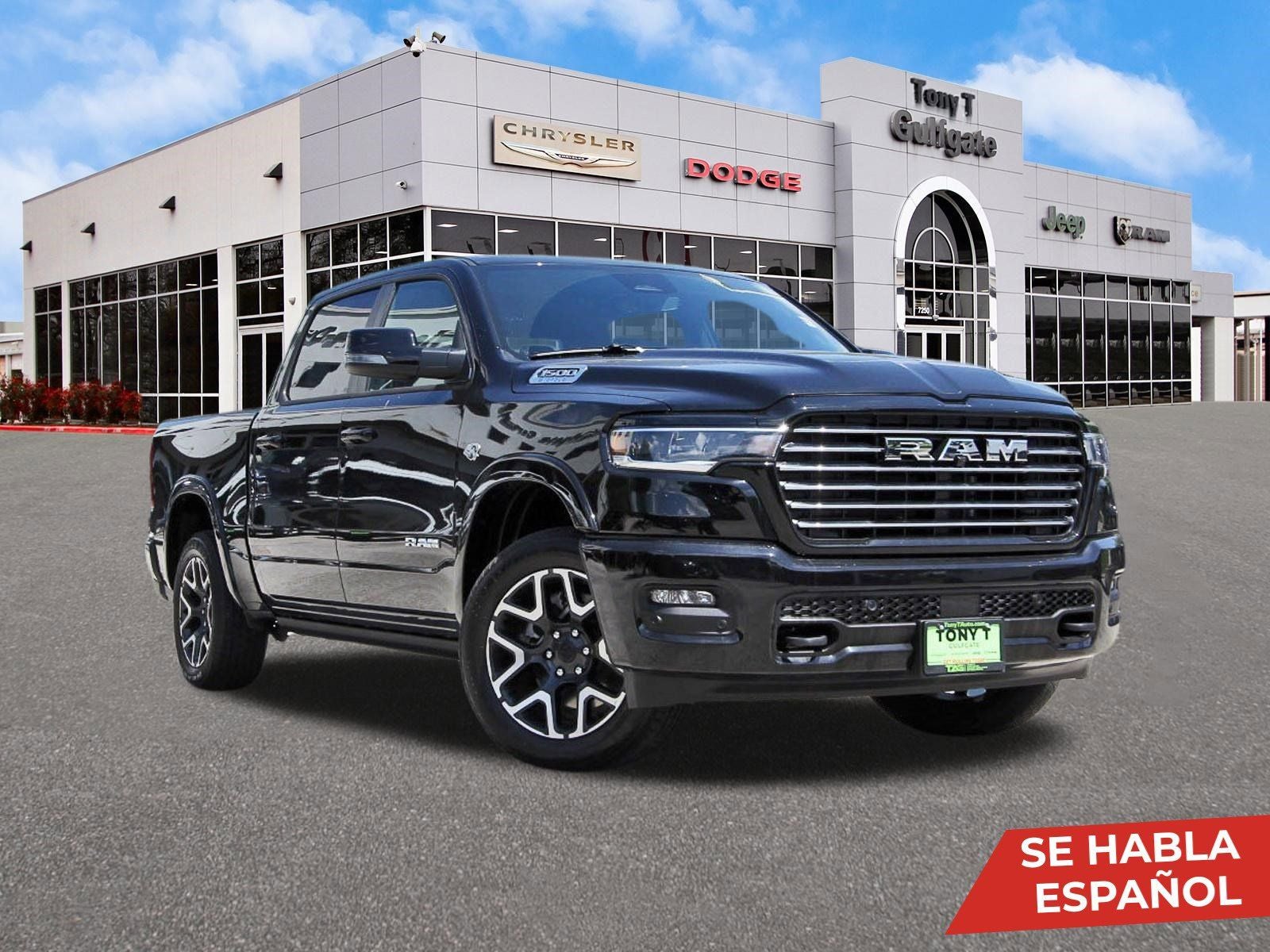 2026 RAM 1500 Laramie 4x4 Crew Cab 5'7" Box in Diamond Black Crystal Pearlcoat — front three-quarter view
