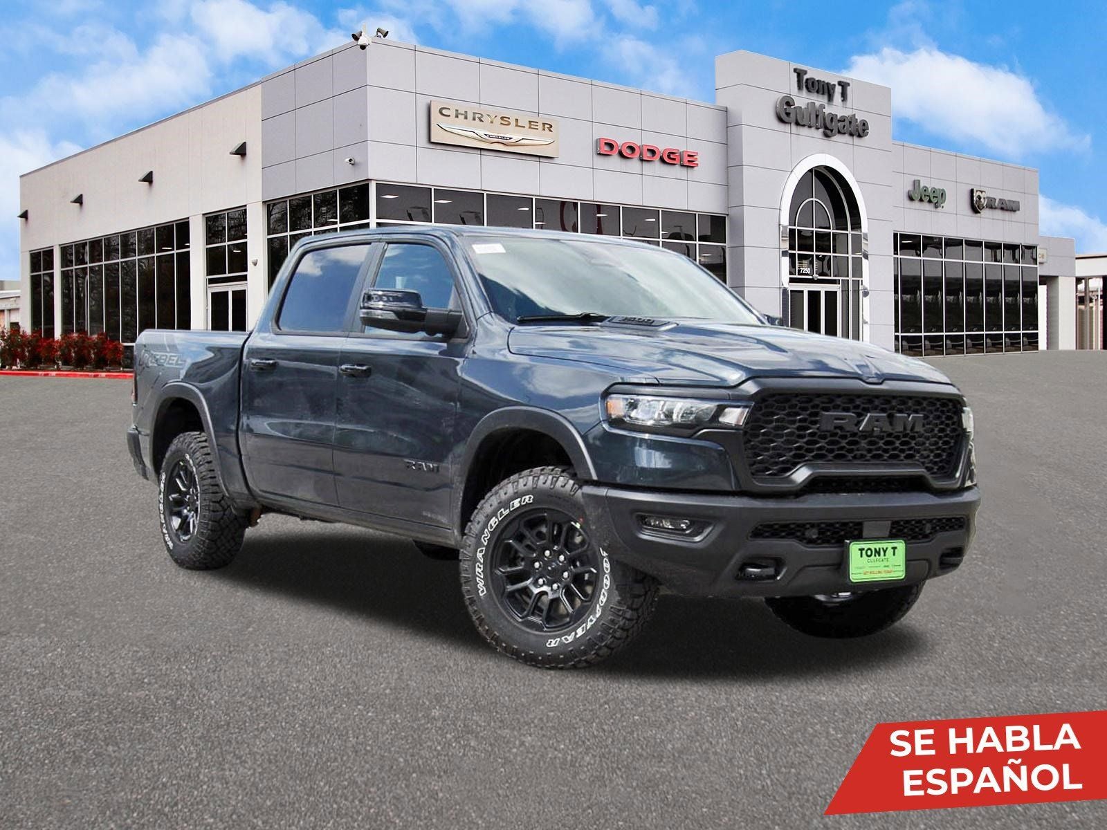 2026 RAM 1500 Rebel 4x4 Crew Cab 5'7" Box in Forged Blue Metallic — front three-quarter view