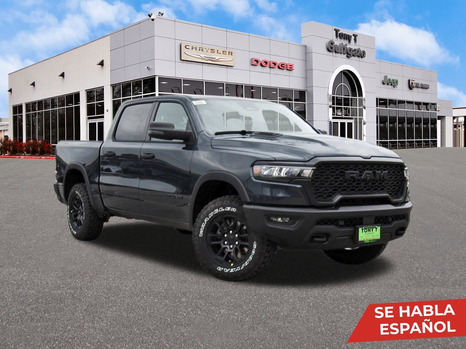 2026 RAM 1500 Rebel 4x4 Crew Cab 5'7" Box in Forged Blue Metallic — front three-quarter view