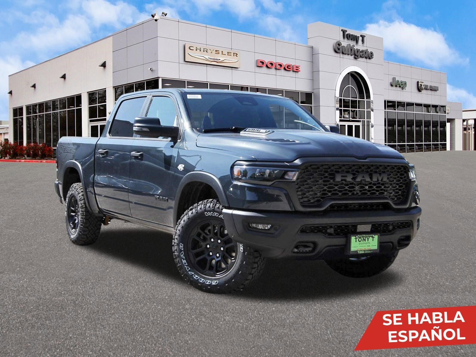 2026 RAM 1500 Rebel 4x4 Crew Cab 5'7" Box in Forged Blue Metallic — front three-quarter view
