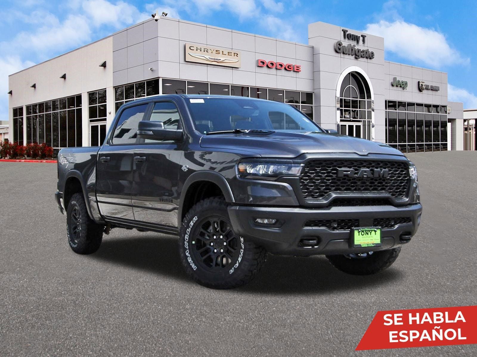 2026 RAM 1500 Rebel 4x4 Crew Cab 5'7" Box in Granite Crystal Metallic Clearcoat — front three-quarter view