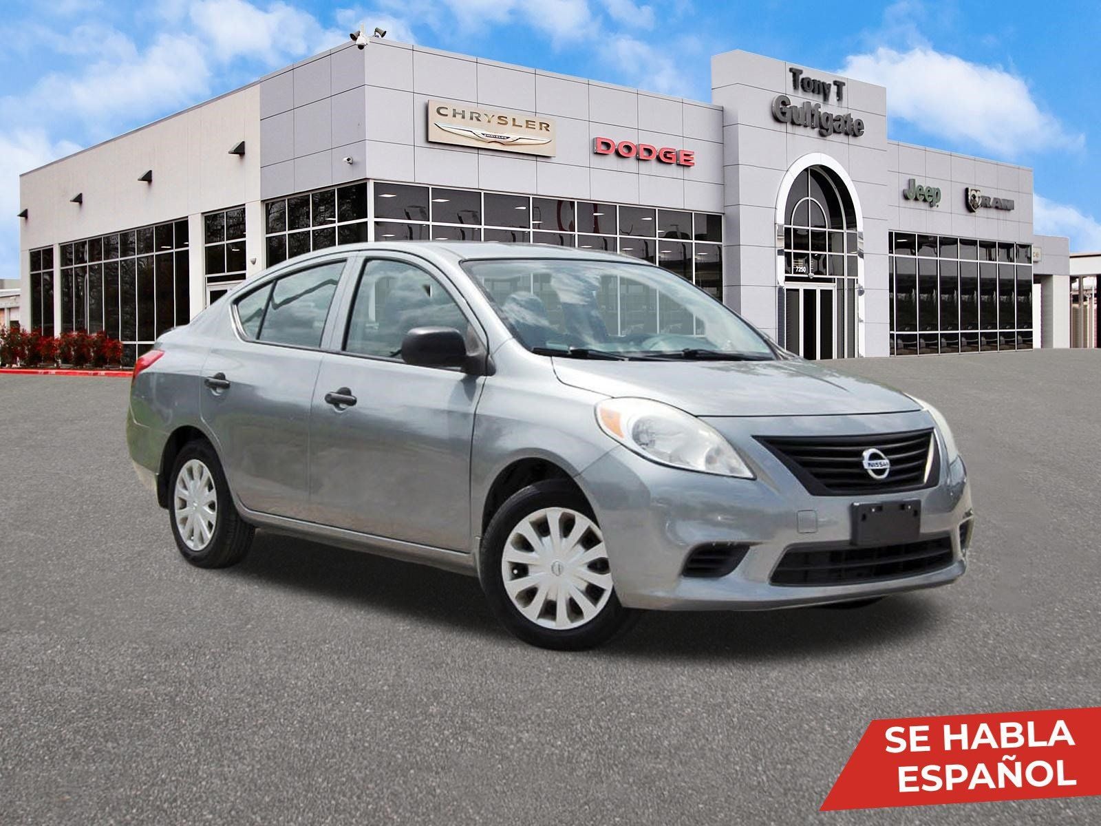 2014 Nissan Versa 1.6 S Plus in Magnetic Gray Metallic — front three-quarter view
